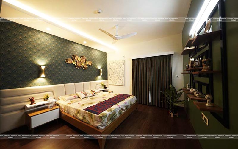 bedroom interior design with green designed wallpaper and bed
