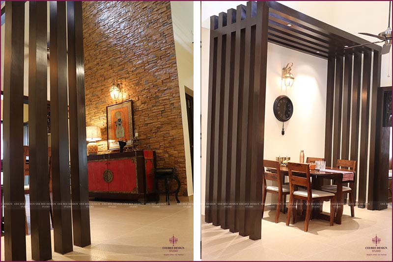 Two dining rooms with wooden dividers. One has a rustic feel with a long wooden table and chairs, while the other is more modern with a round table and sleek chairs.