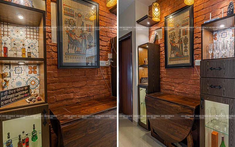 brick design wall with wall art and wooden shelves