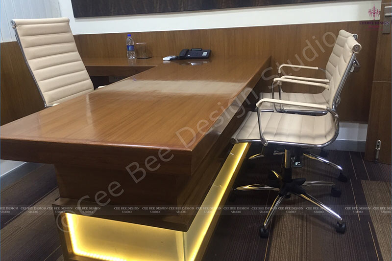 a sleek office desk with a wooden top, perfect for a modern workspace