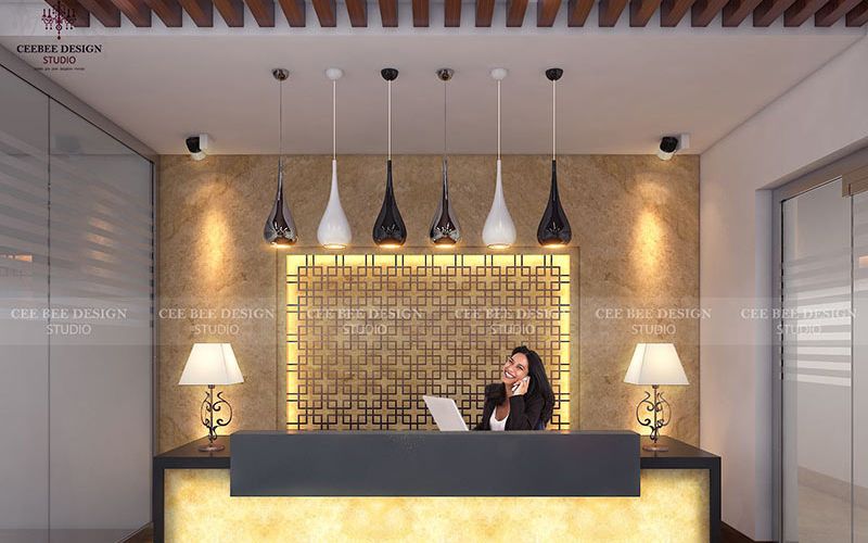 a woman sitting at a modern office reception desk, ready to assist visitors and manage administrative tasks efficiently