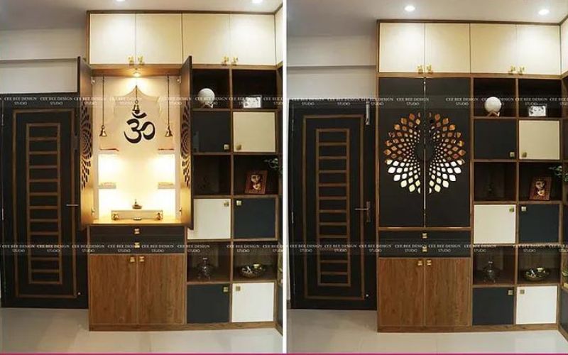 home mandir with om and bells and black covered shelf