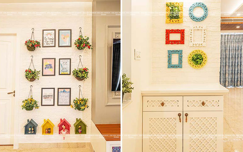 a room with a white wall and a wooden cabinet