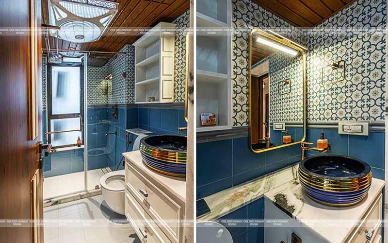 Bathroom featuring coordinated blue walls and sink.