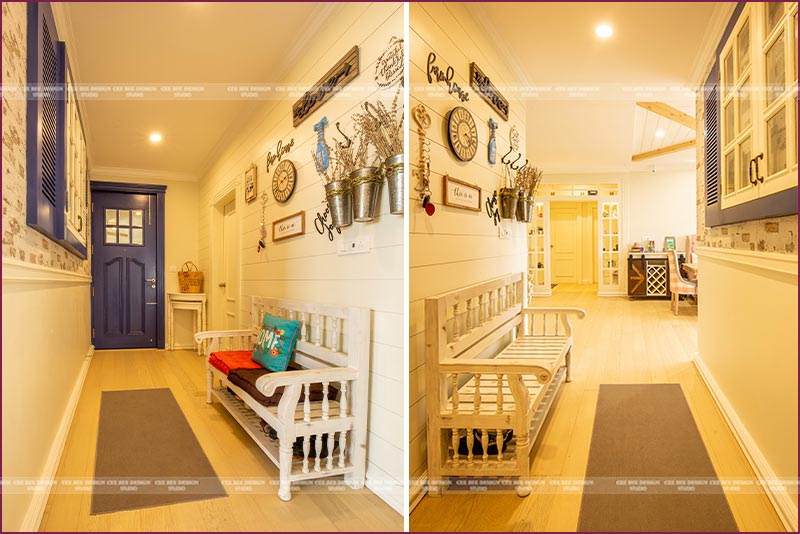 An empty hallway featuring a bench and a closed door.