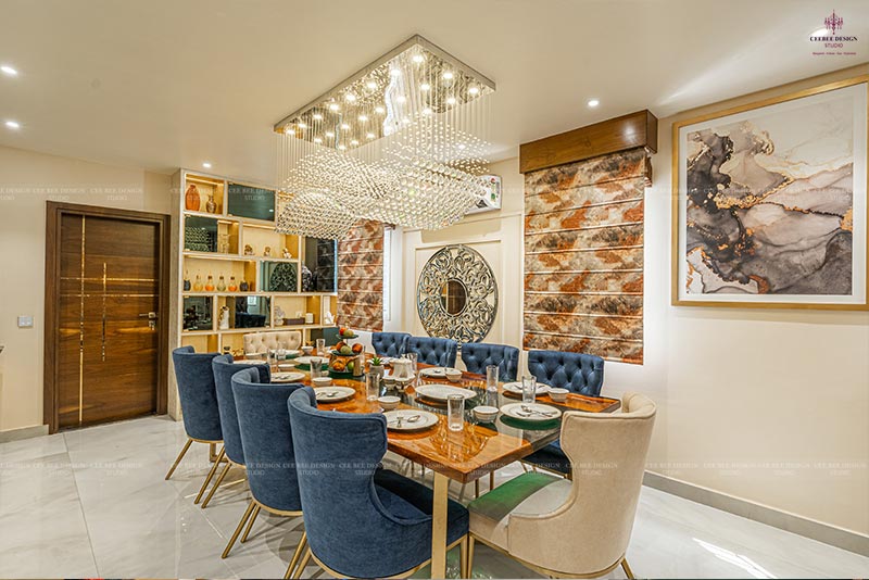 modern dining area with dining table and chairs with ceiling lights