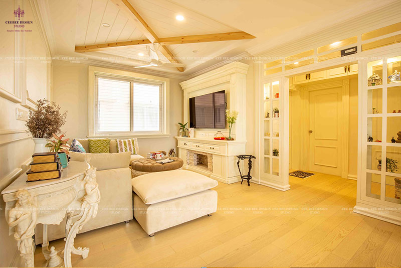 white interior design living room with furniture and tv mounted on wall