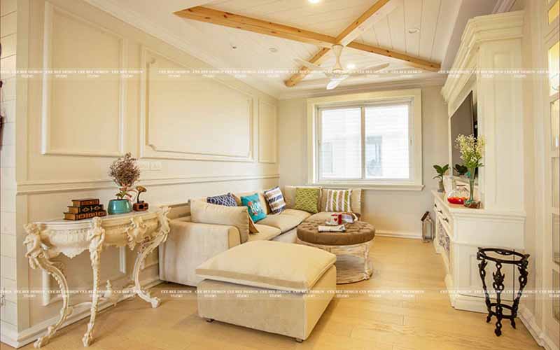 white living room interior design with sofa and cushions and tv in front