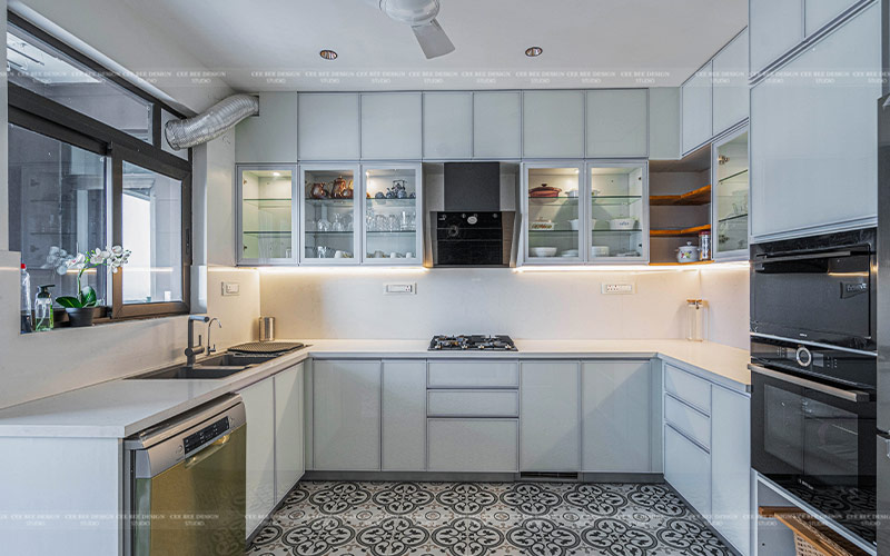 whitish clean modular kitchen design with efficient technology
