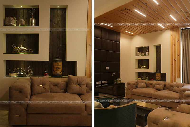 wooden ceiling with brown coloured sofa and funitures  show pieces in the racks