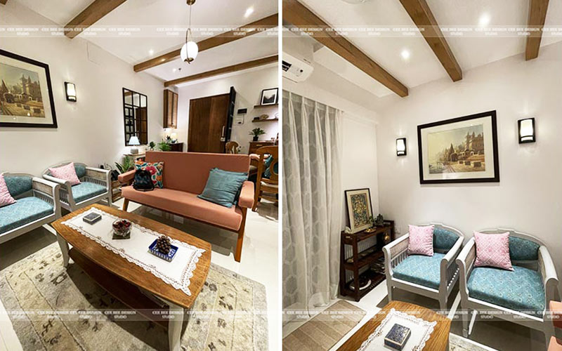 wooden frame of sofa in the living area with wooden table and chairs carpet